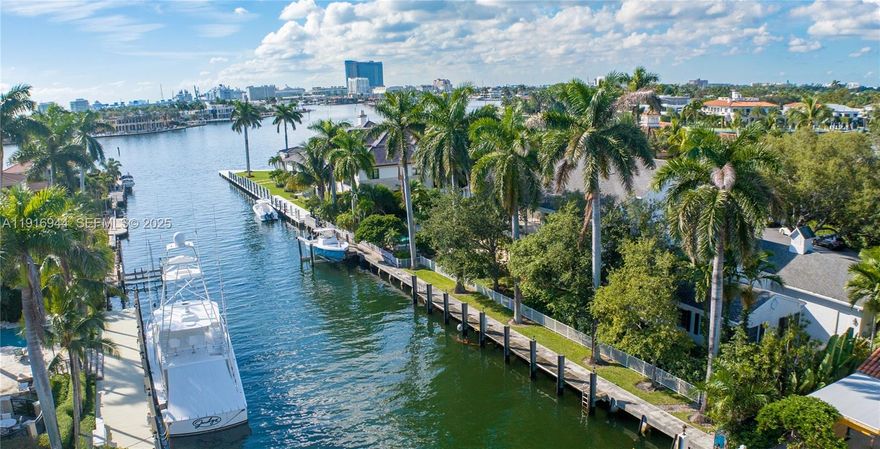 A truly rare Las Olas waterfront offering, just one property from the point and distinguished by an extraordinary 235 feet of straight-line Intracoastal frontage—an unparalleled setting for a premier yachting lifestyle. Set on an expansive 18,744-square-foot lot, the estate offers effortless ocean access, a private boat lift, and sweeping water views. The stately Colonial residence features nearly 5,000 square feet under A/C with four generously scaled ensuite bedrooms, 5.1 baths, and a three-car garage, enhanced by a major two-story addition completed in 1992. Outdoors, a resort-style pool and spa are framed by mature, manicured landscaping on one of Las Olas’ most prestigious streets.