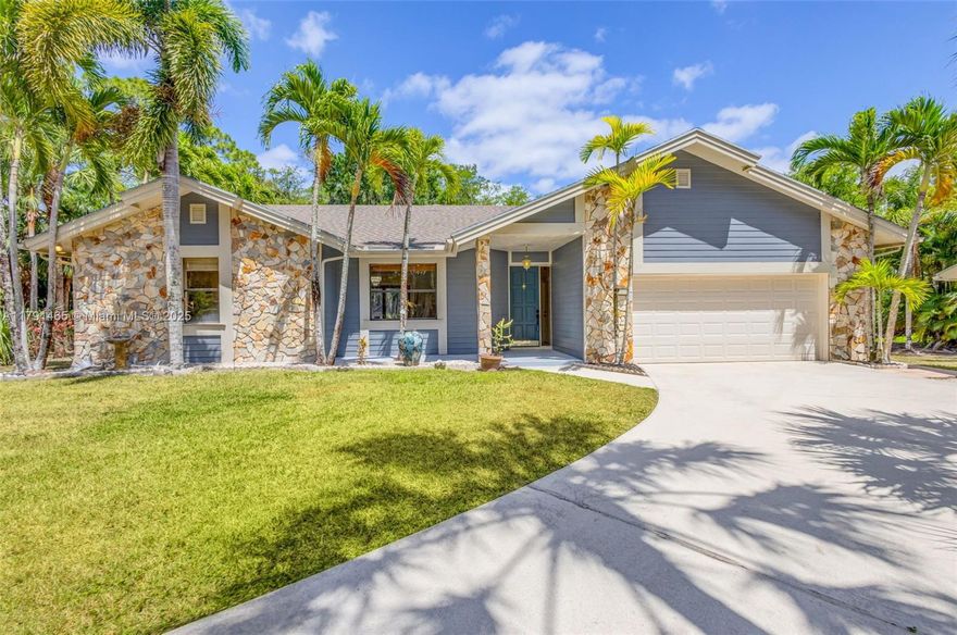 YOUR WAIT IS OVER... ONE-OF-A-KIND 3 Bed, 2 Bath, 2 Car Garage, CBS-POOL-HOME, in Sought After JUPITER FARMS. Features an Inviting Floor Plan, Remodeled Kitchen, Custom Cabinetry, Granite Countertops, SS Appliances, Wall Oven, Serving Bar, Spacious Master Suite, Walk-in Closet, Spa Style Bath, Dual Sink Vanity, Jetted Jacuzzi Tub, Glass Shower Enclosure, Generous Guest Rooms, Vaulted Ceilings, Fireplace, LVP Flooring, Expansive Covered & Screened-in Patio ***NEWLY RENOVATED POOL w/SPA/COLD PLUNGE*** Tankless W/H, Whole House Generator, Secluded Oversized Lot w/Dual Entrances & Private Access to Paved Nature Trail Leading to Riverbend Park.  Standalone Carport & Shed. Plenty of Room for Storage. Minutes to World Famous Beaches, Watersports, Golf, Shopping & Dining.  TOP RATED SCHOOLS!!!