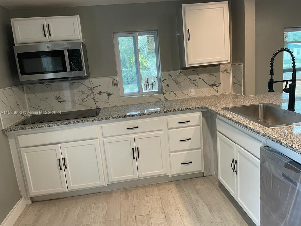 Photo of 1617 Avenue E, Fort Pierce, FL 34950 (MLS # A11536800)