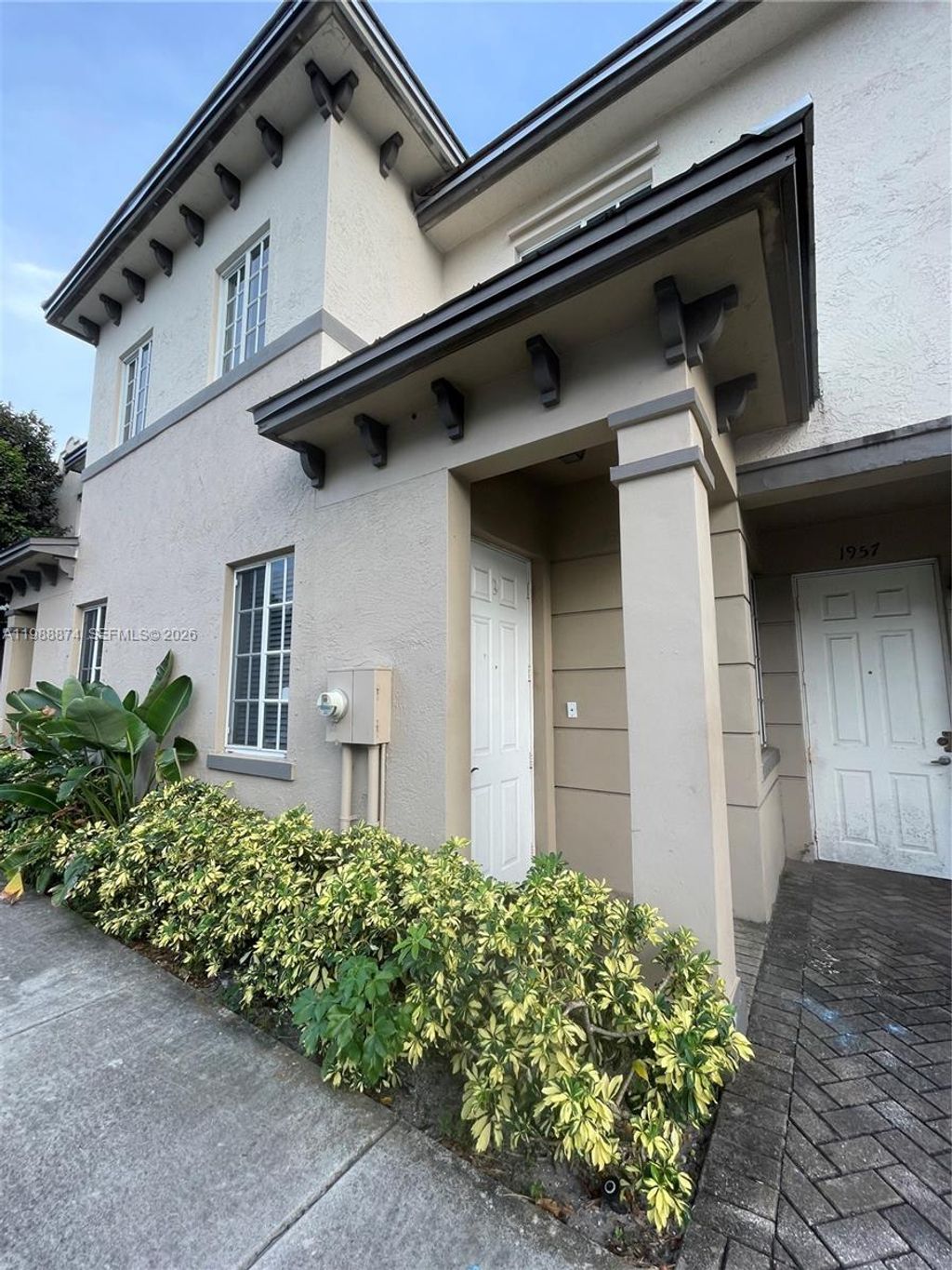 Photo of 1955 Marsh Harbor Dr #1955, Riviera Beach, FL 33404 (MLS # A11988874)