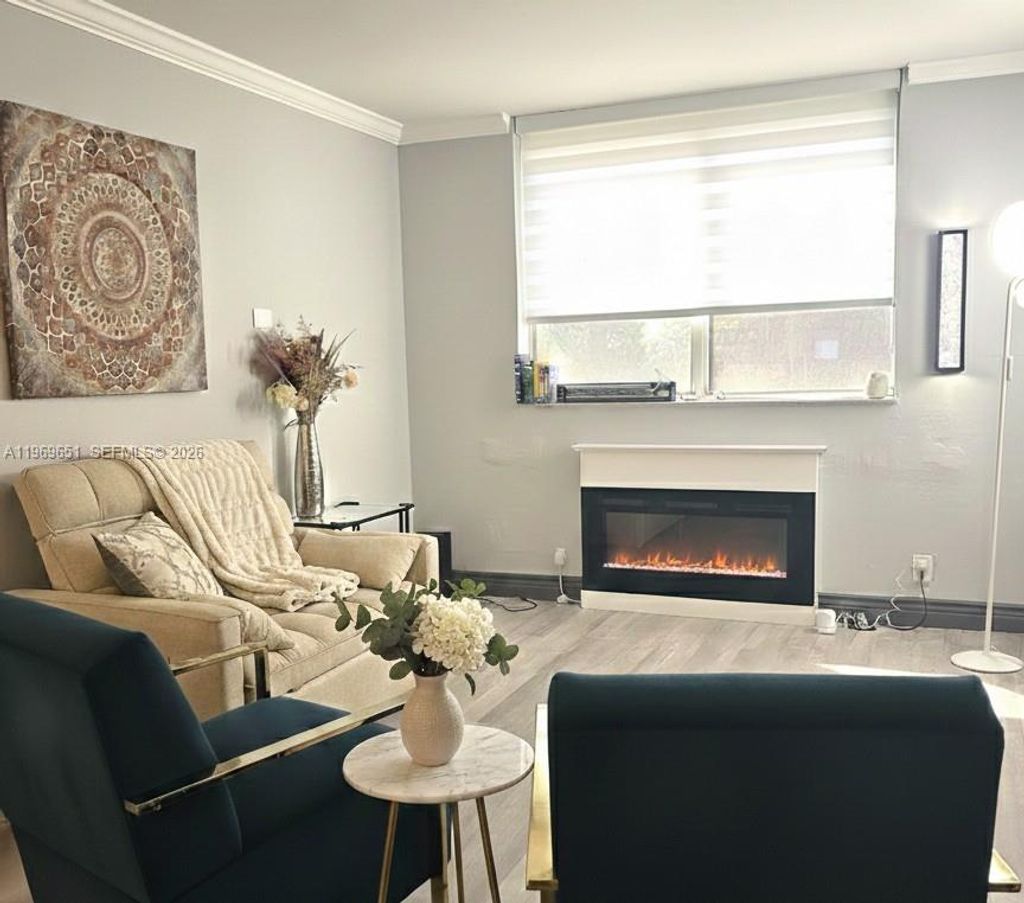 Photo of 2401 Riverside Dr #313-B, Coral Springs, FL 33065 (MLS # A11969651)