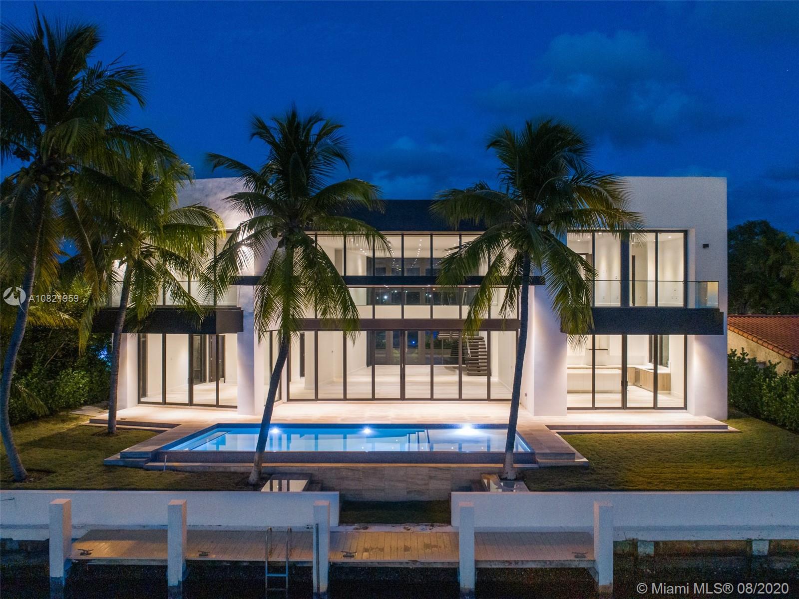 This BRAND NEW 5,228 sq ft modern masterpiece situated on the beautiful OPEN WATER Maule Lake offers unobstructed water views and 100 ft of prime water frontage in the gated community of Eastern Shores. Done to the nines with no expense spared, this move-in ready home is filled with natural light from the floor-to-ceiling windows and tremendous ceiling height throughout. Interior and exterior finishes such as natural woods, glass railings, oversized tile floors and a beautifully designed infinity pool make this a true work of art. Enjoy your own private oasis and panoramic views from your palm tree filled backyard paradise!