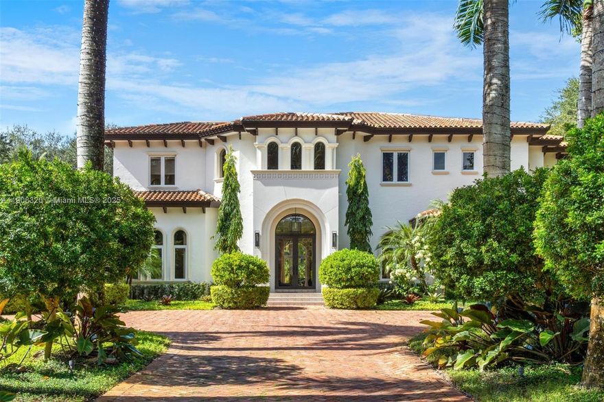 This stunning 6-bed, 7.5-bath Mediterranean estate, located in prestigious North Pinecrest, spans 9,045 total SF on a 50,529 SF lot. Fully renovated with top-tier finishes, this residence epitomizes grand living with a dramatic two-story foyer overlooking the pool and gardens, soaring ceilings, elegant tile and wood floors, custom Mia Cucina cabinetry, and integrated Crestron and Lutron systems. The open kitchen features Wolf and Sub-Zero appliances and a breakfast area. Outdoor living shines with resort style amenities, two covered terraces, a summer kitchen, salted pool with waterfall spa, half basketball/multi-purpose court, lush landscaping, and manicured gardens. Includes 3-car garage, generator, solar panels, and security system—luxury, comfort, and technology in perfect harmony.