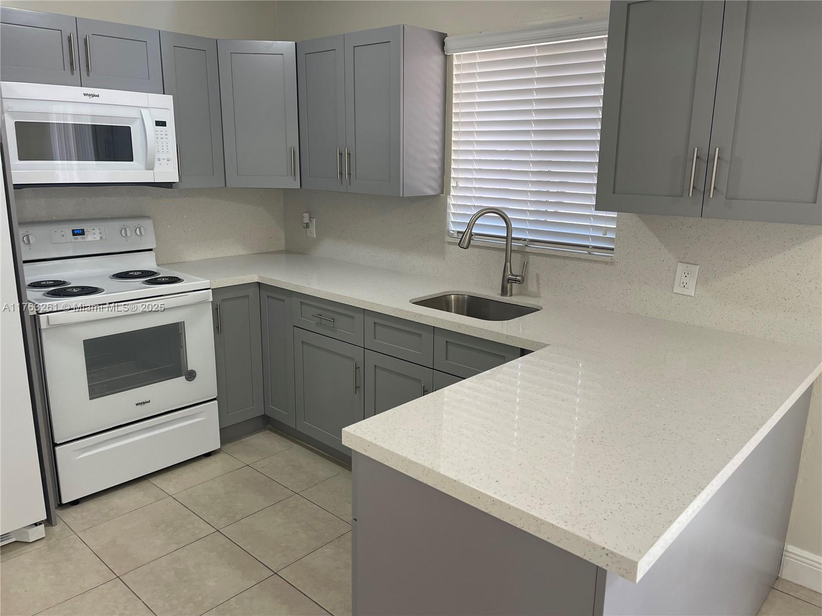 Newly renovated townhouse with 3 bedrooms, 2 full bathrooms upstairs and 1 half bathroom on the first floor. 3 parking spaces! Never used kitchen with quartz countertops, cabinets and brand new appliances. Fenced patio with plenty of space. Master bedroom features a walk-in closet and on suite bathroom. Centrally located near major highways, great schools and plenty of shopping centers.