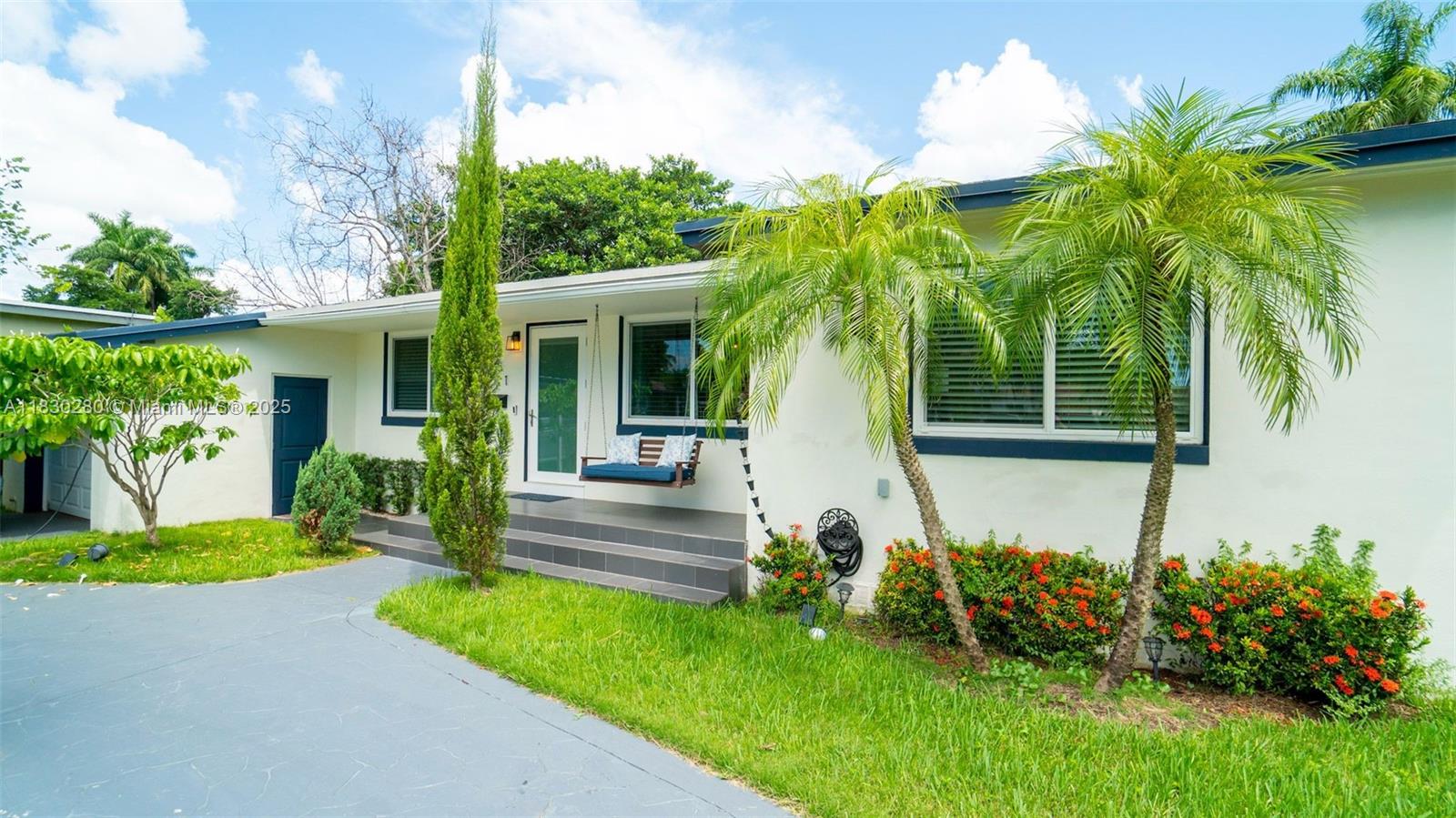Effortless charm meets smart design in this fully updated family home. Perfect for a family or generate income right away as a furnished AirBNB. Located between Miami Shores and Biscayne Park, this 3BD/2BA gem offers the ideal mix of style, space, and location. Renovated by a designer-owner, it features a split floorplan, wood-look porcelain in living areas, warm wood floors in bedrooms, and a bright Florida room overlooking the backyard deck. The kitchen shines with white cabinetry, butcher block counters, and stainless appliances. Impact windows/doors, EV charger, 1-car garage + carport. Central location close to it all, just minutes to top schools like Miami Country Day, Barry University, village shops and dining, Biscayne BLVD, and a short ride to beaches!