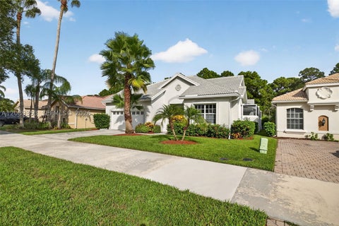 Photo of 619 SW Lake Charles Cir, Port St Lucie, FL 34986 (MLS # A12089353)