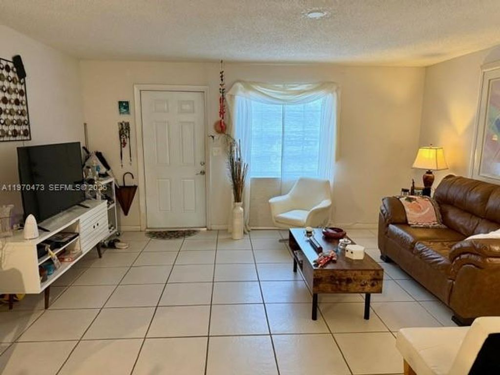 Photo of 2200 Monroe St #6, Hollywood, FL 33020 (MLS # A11970473)