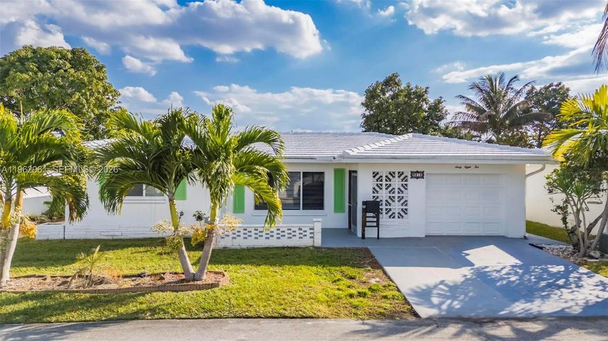 Spacious and beautifully upgraded 3BR/2BA home in a desirable 55+ community with serene water views and modern comfort throughout. Featuring wood-look laminate flooring in every room for a warm, cohesive feel. Major updates include a 2019 roof, impact windows, hurricane-rated garage door, stainless steel appliances, and washer/dryer (2020). Tastefully renovated bathrooms and a generous primary suite with walk-in closet. Enjoy enhanced exterior lighting and low HOA with access to pool, clubhouse, and picnic area. A perfect blend of upgrades, lifestyle, security, and value in an active adult community.<b>The Open House scheduled for 2/21/2026 has been cancelled.</b>.