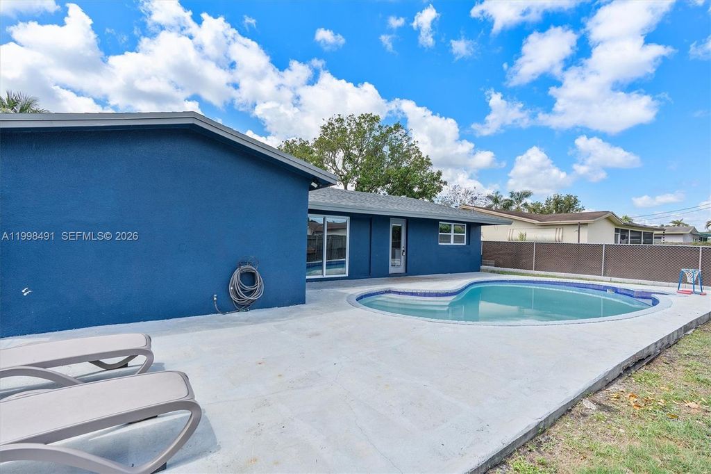 Photo of 11841 NW 30th Pl, Sunrise, FL 33323 (MLS # A11998491)