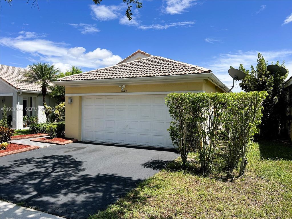 Photo of 1605 Salerno Cir, Weston, FL 33327 (MLS # A11961695)