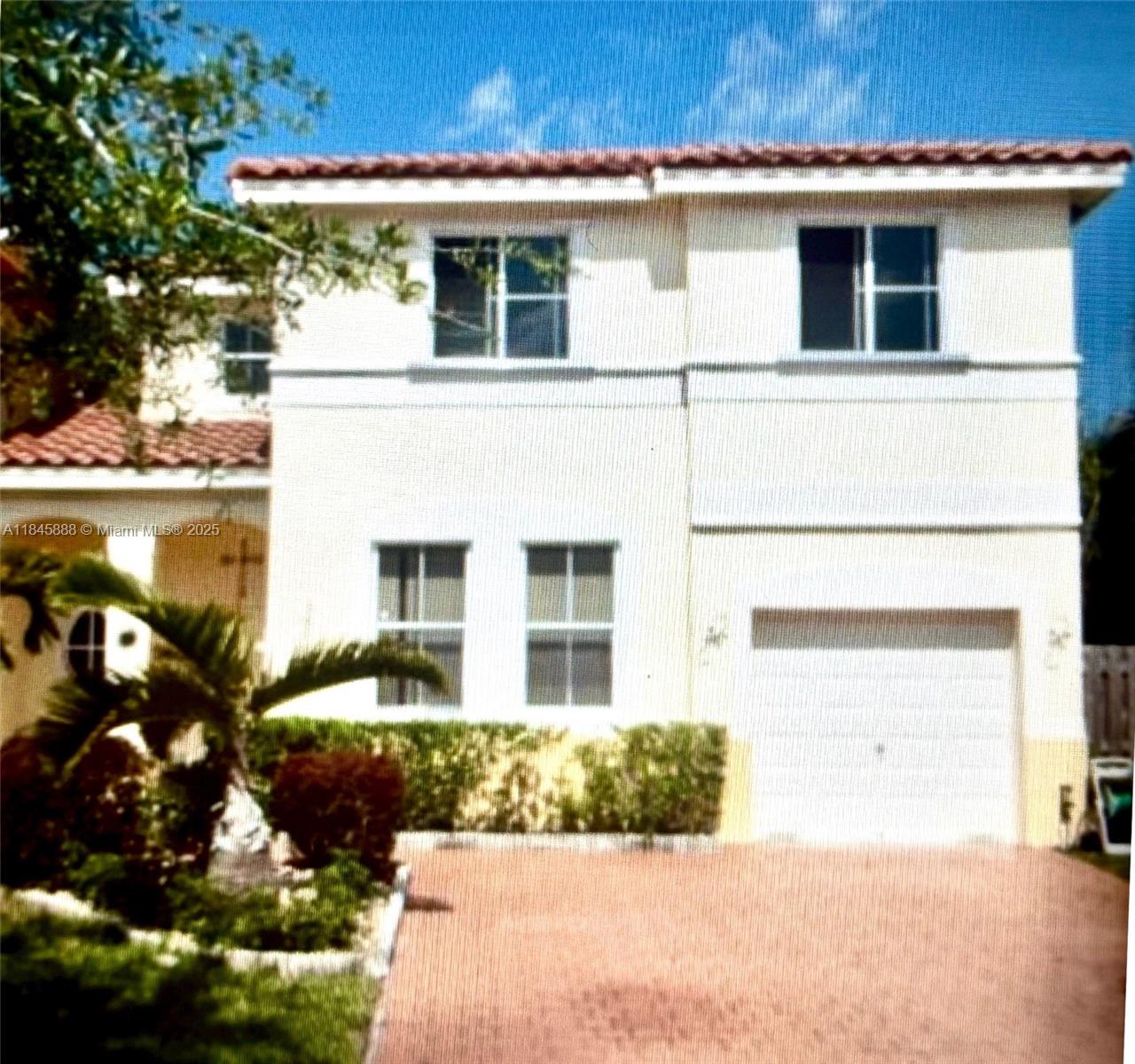 Welcome to this well-maintained, 4 BR, 2.5 bath corner townhouse located in the desirable community of Nautica. This spacious 2-story home features an open concept layout with volume ceilings and abundant natural light, perfect for both entertaining and every day living. Well appointed kitchen. Boasts granite countertops, stainless steel appliances, ample cabinet space and pantry. Enjoy your private, outdoor oasis that includes eating area, koi pond, and hot tub.
Tropical landscaping that includes low maintenance, artificial turf. Convenient access to major highways. This townhome has a distinct single family home feel.