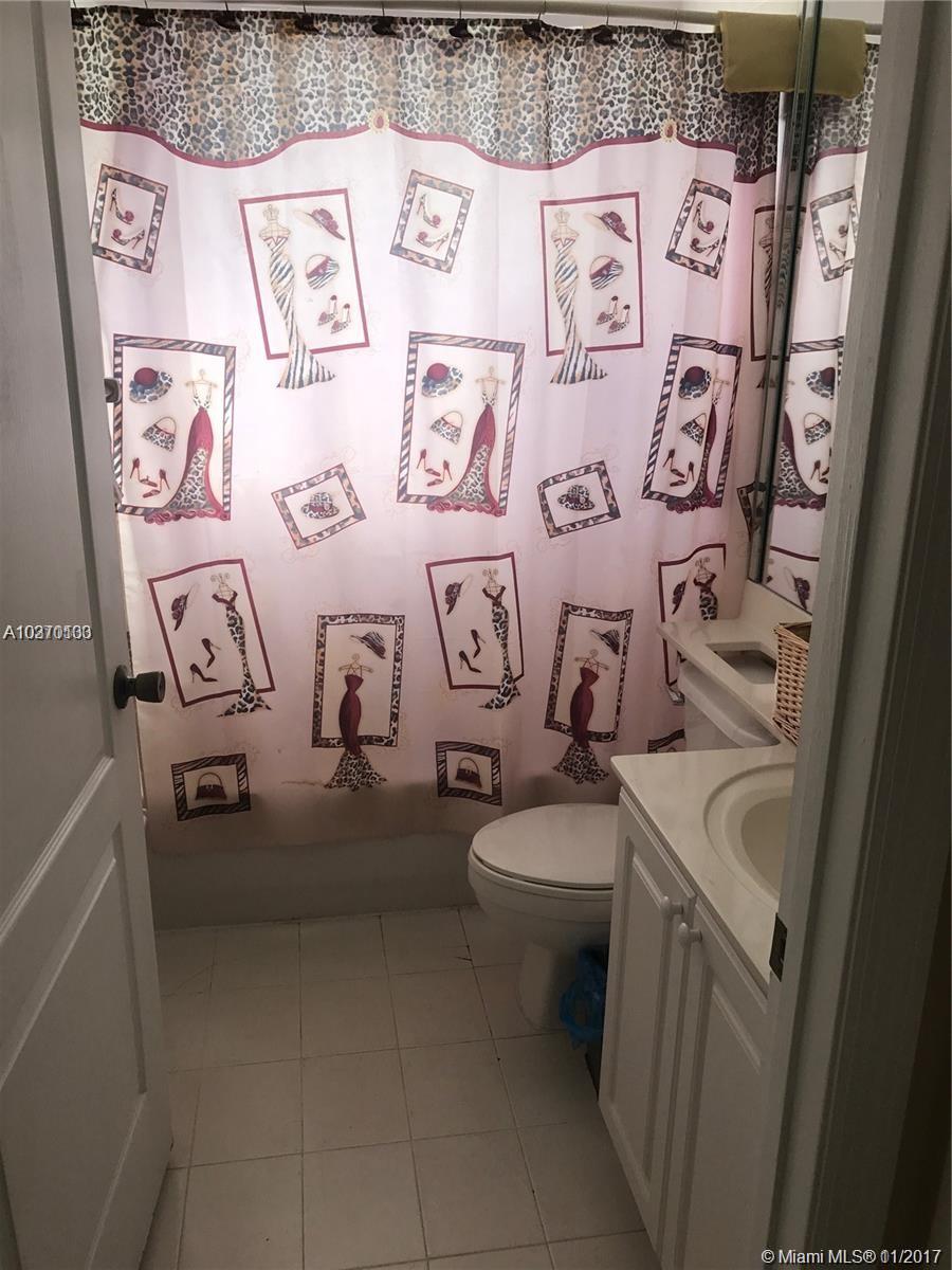 This is a beautiful 2 bed / 2 bath in Tropical Court Villas in the highly desirable Hialeah Gardens area. Washer and Dryer in unit .Tiled floor all over.Excellent Location ans easy to show . Call listing agent for showings