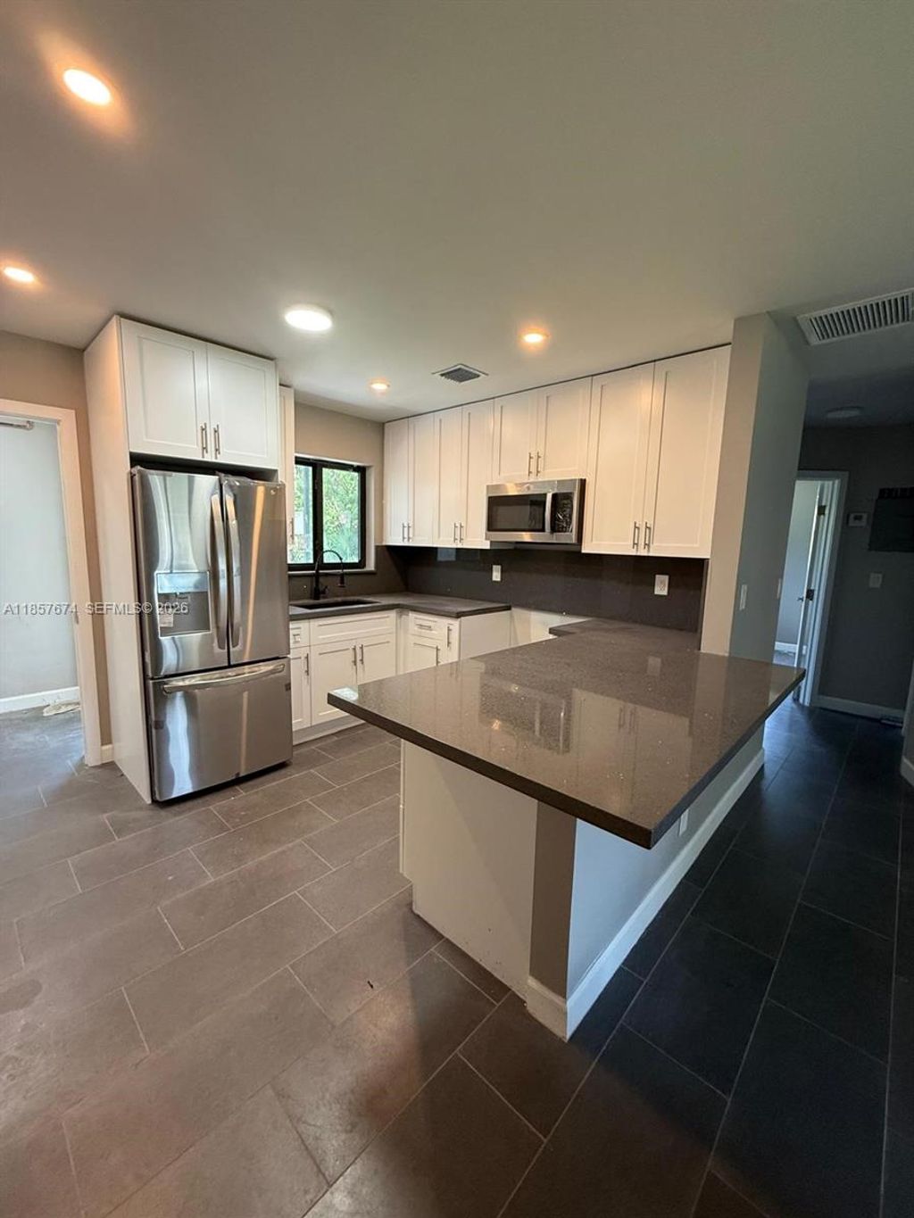 Photo of 2929 SW 19th St #1-2, Fort Lauderdale, FL 33312 (MLS # A11857674)