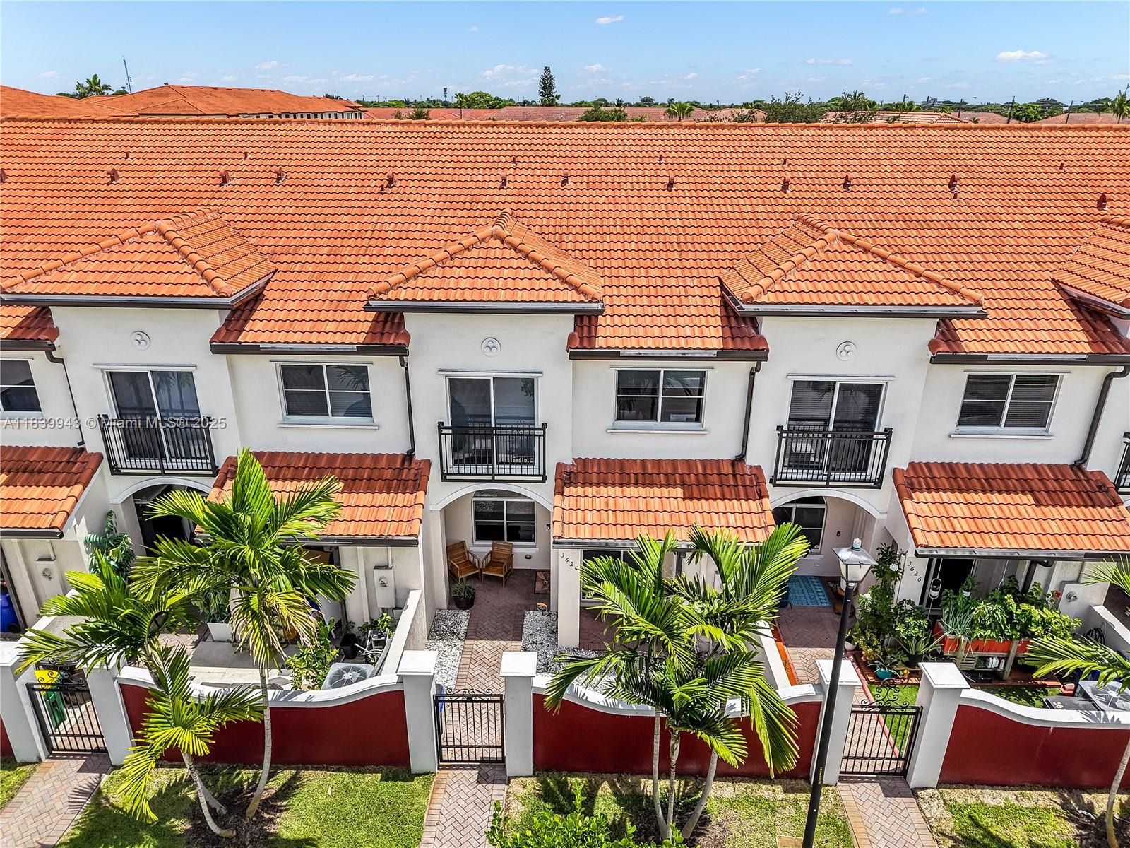 Beautiful and move-in ready 2 bed, 2.5 bath, two-story townhome built in 2018 by DR Horton in the highly desirable Bella Vista community. Greet guests at your private gated patio and step into a bright, open-concept living and dining area with high ceilings throughout the home—downstairs boasts impressive 9' ceilings—perfect for relaxing or entertaining. The kitchen features wood cabinetry and a layout that flows beautifully into the main living space. Upstairs offers 2 spacious master suites, each with its own full bath. Enjoy the convenience of in-unit laundry and 2 assigned parking spaces. Community amenities include clubhouse, pool, gym, racquetball court, and 24/7 security. Ideally located near top schools, shops, dining, parks, and major highways like 441, I-95, and the Turnpike.