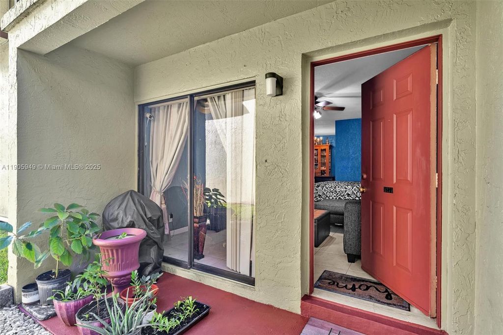 Photo of 3270 NW 104th Ave #3270, Coral Springs, FL 33065 (MLS # A11905949)