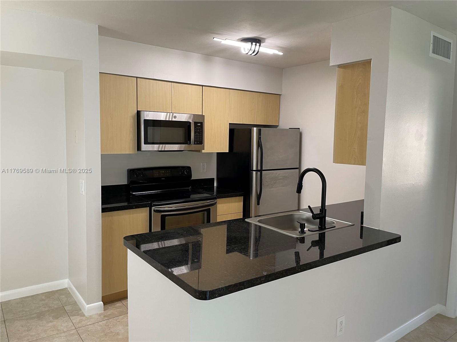 Rental Property at 751 Nw 104th Ave 103, Pembroke Pines, Miami-Dade County, Florida - Bedrooms: 2 
Bathrooms: 2  - $2,300 MO.