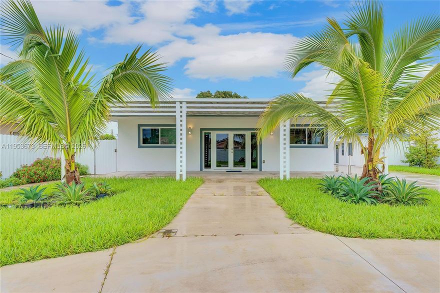 Here’s a polished, MLS-ready rewrite that keeps it compliant, compelling, and clean while elevating the tone and flow:

Fully renovated 4-bedroom, 4-bath residence situated on an oversized lot in the rapidly growing West Flagler neighborhood. Ideally located just minutes from Downtown Miami, Brickell, Miami International Airport, and Miami Freedom Park, offering exceptional long-term upside.

The home showcases a sleek, modern design featuring polished concrete floors, a contemporary kitchen with white shaker cabinetry, stainless steel appliances, granite countertops, and stylish finishes throughout. Beautifully updated bathrooms, spacious walk-in closets, and thoughtful details reflect the care taken in designing this home.

The property may be enjoyed as a single 4/4 residence or as currently configured with three separate living quarters providing strong monthly income. Existing layout includes a 2/2 rented at $2,400/month, an attached 1/1 rented at $1,150/month, and a detached 1/1 cottage rented at $1,600/month.

Primary Land Use is Single Family with Additional Living Quarters and the property is surrounded by duplex zoning.