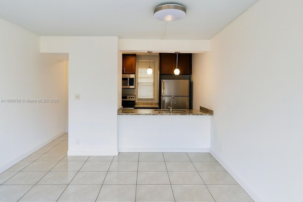 Photo of 9909 Twin Lakes Dr #26-F, Coral Springs, FL 33071 (MLS # A11809768)