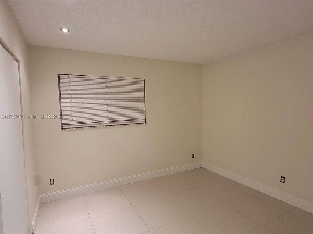 Photo of 3409 NW 44th St #103, Oakland Park, FL 33309 (MLS # A11765607)