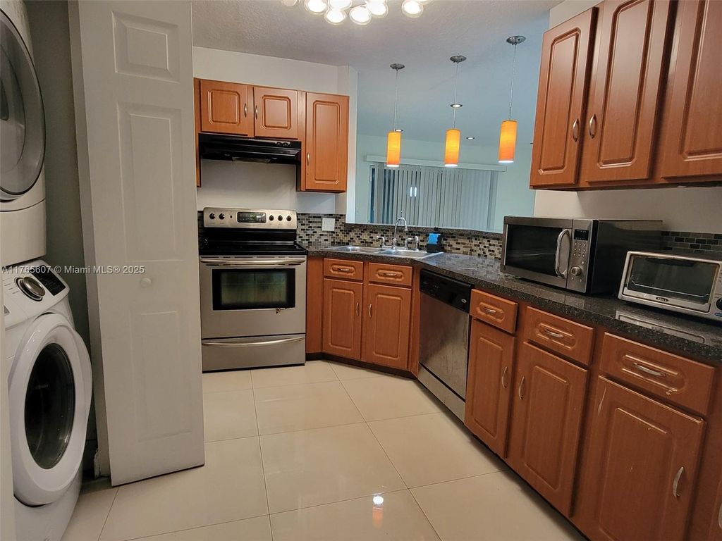 Photo of 3409 NW 44th St #103, Oakland Park, FL 33309 (MLS # A11765607)