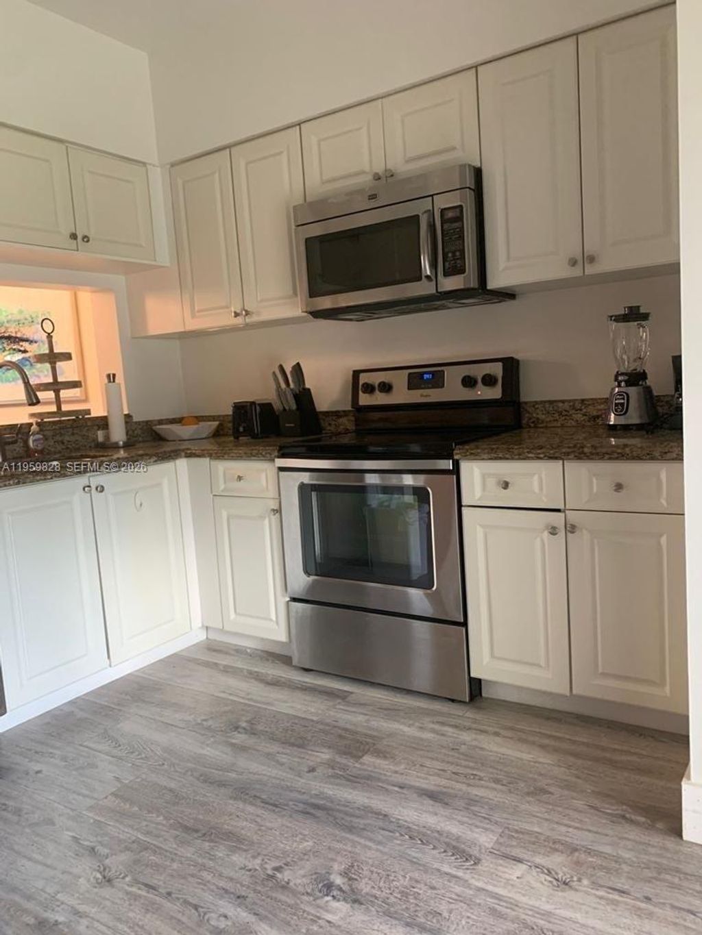 Photo of 20 Key West Ct, Weston, FL 33326 (MLS # A11959828)