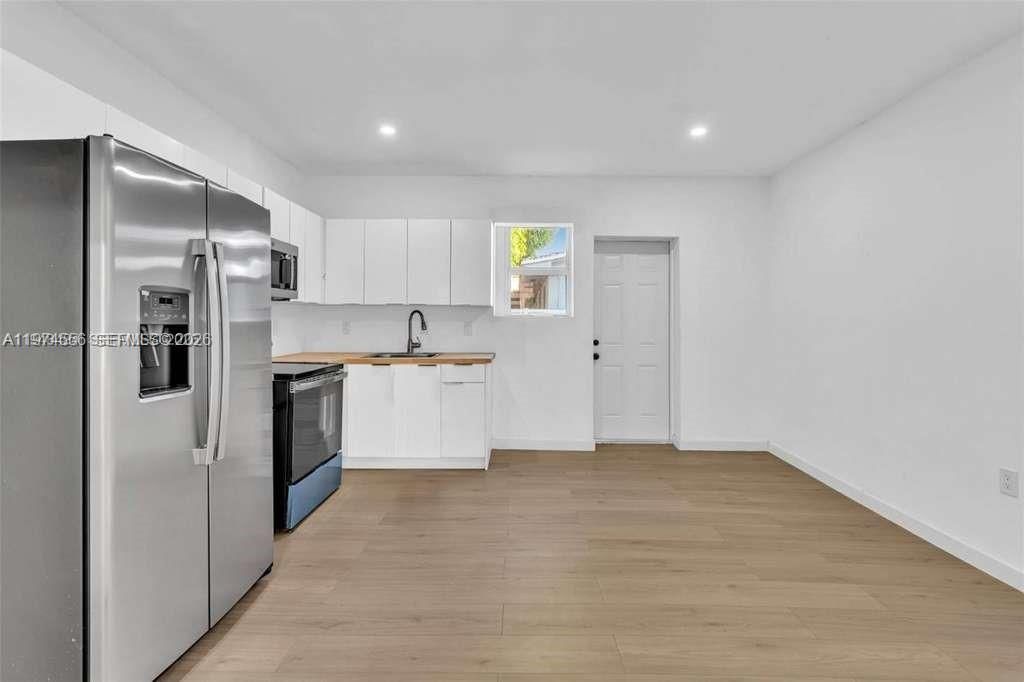 Photo of 709 SW 4th Ct #1-7, Fort Lauderdale, FL 33315 (MLS # A11974556)