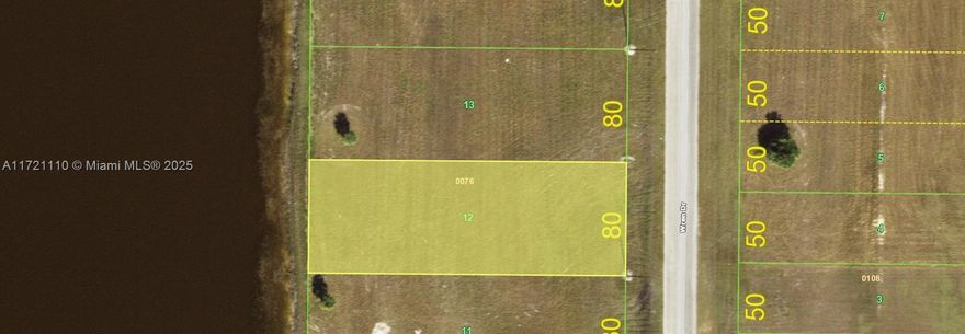 Large waterfront lot to build your dream home in the Rotonda Meadows community in Port Charlotte. Deed restricted community.Central water and sewer.