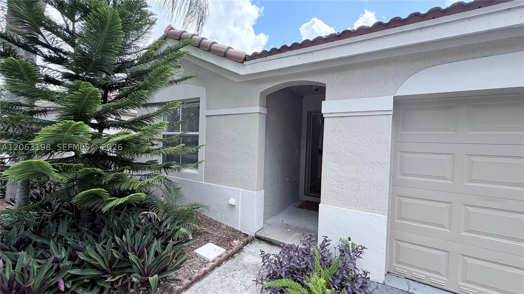 Photo of 2020 Andromeda Ln #2020, Weston, FL 33327 (MLS # A12063198)