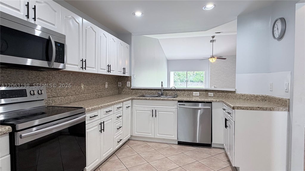 Photo of 2020 Andromeda Ln #2020, Weston, FL 33327 (MLS # A12063198)