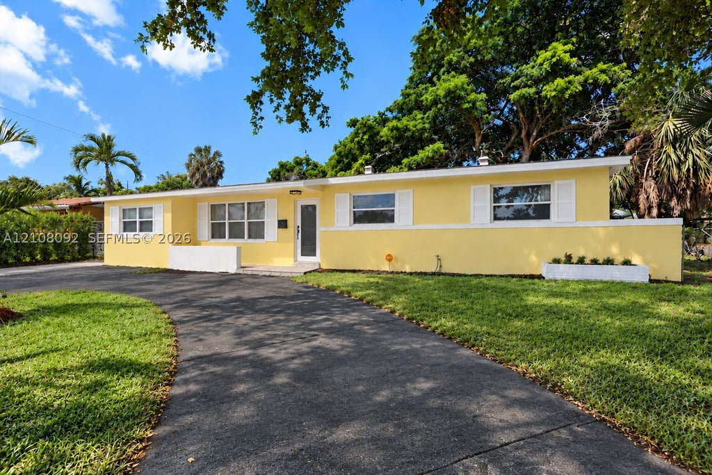 Photo of 3621 NW 6th Pl, Lauderhill, FL 33311 (MLS # A12108092)