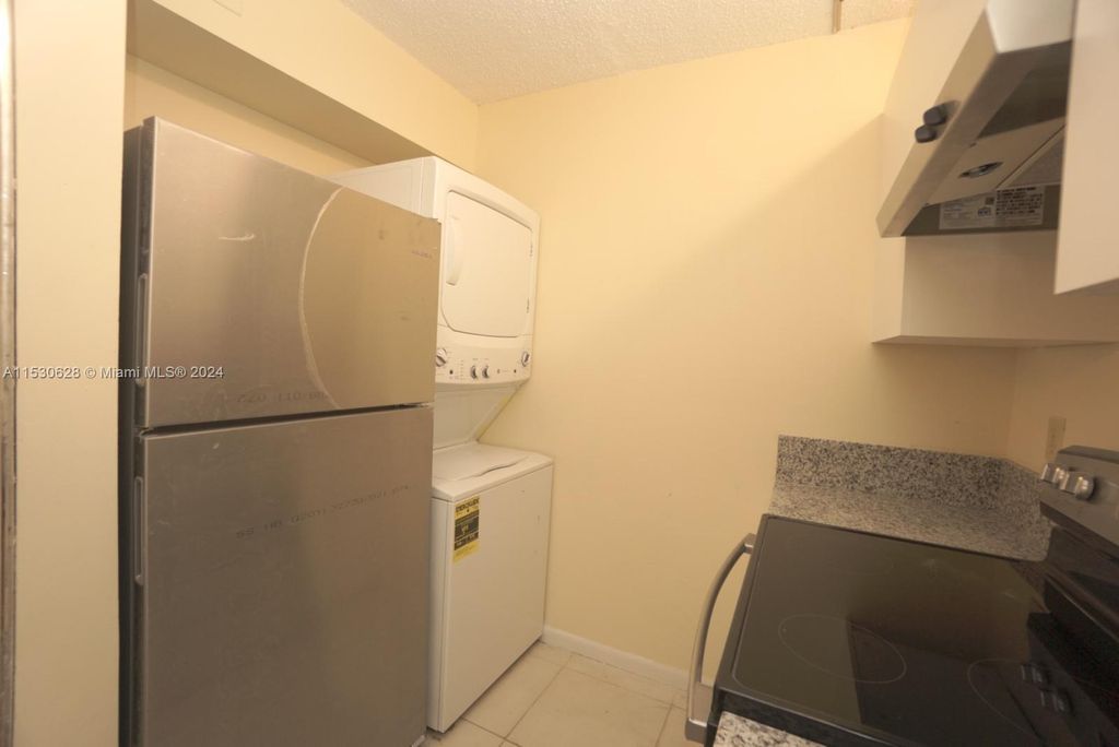 Photo of 820 Twin Lakes Dr #820, Coral Springs, FL 33071 (MLS # A11530628)