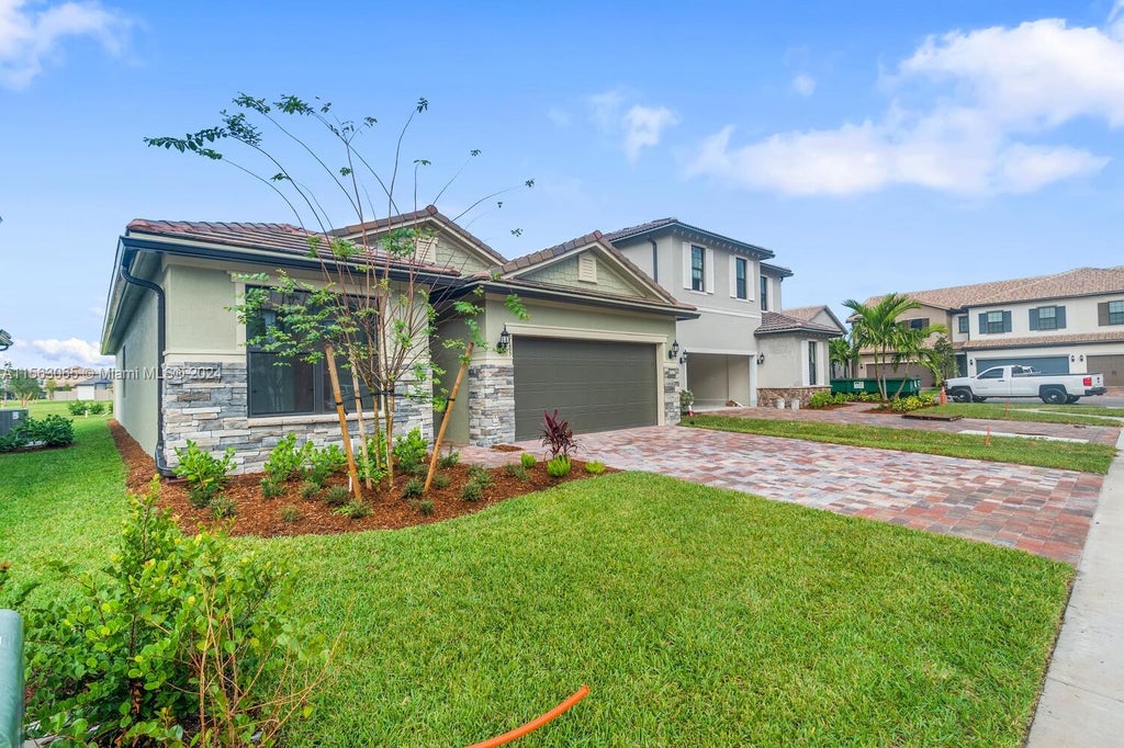 Photo of 8185 Tailshot Ct, Lake Worth, FL 33467 (MLS # A11563065)