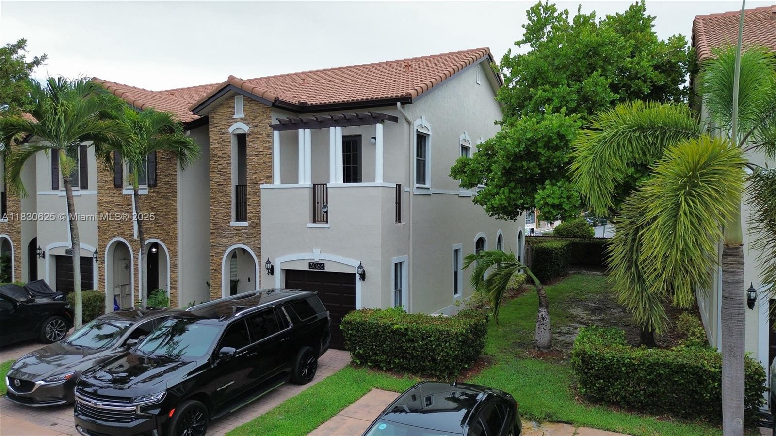 Spacious three-bedroom, two-and-a-half-bathroom townhome in Doral’s desirable gated community, Milan by Lennar. This two-story home boasts a modern kitchen with wood cabinets, granite counters, stainless steel appliances, and ceramic flooring on the first floor. Additionally, it features a large master suite with a walk-in closet and vinyl flooring throughout the second floor. Enjoy the fenced patio, accordion shutters, and garage with an automatic opener. Conveniently located near the Turnpike, 826, and 836 expressways. Community amenities include a pool, gymnasium, and toddler play area. Furthermore, it is situated within the school district of some of the city’s top schools.