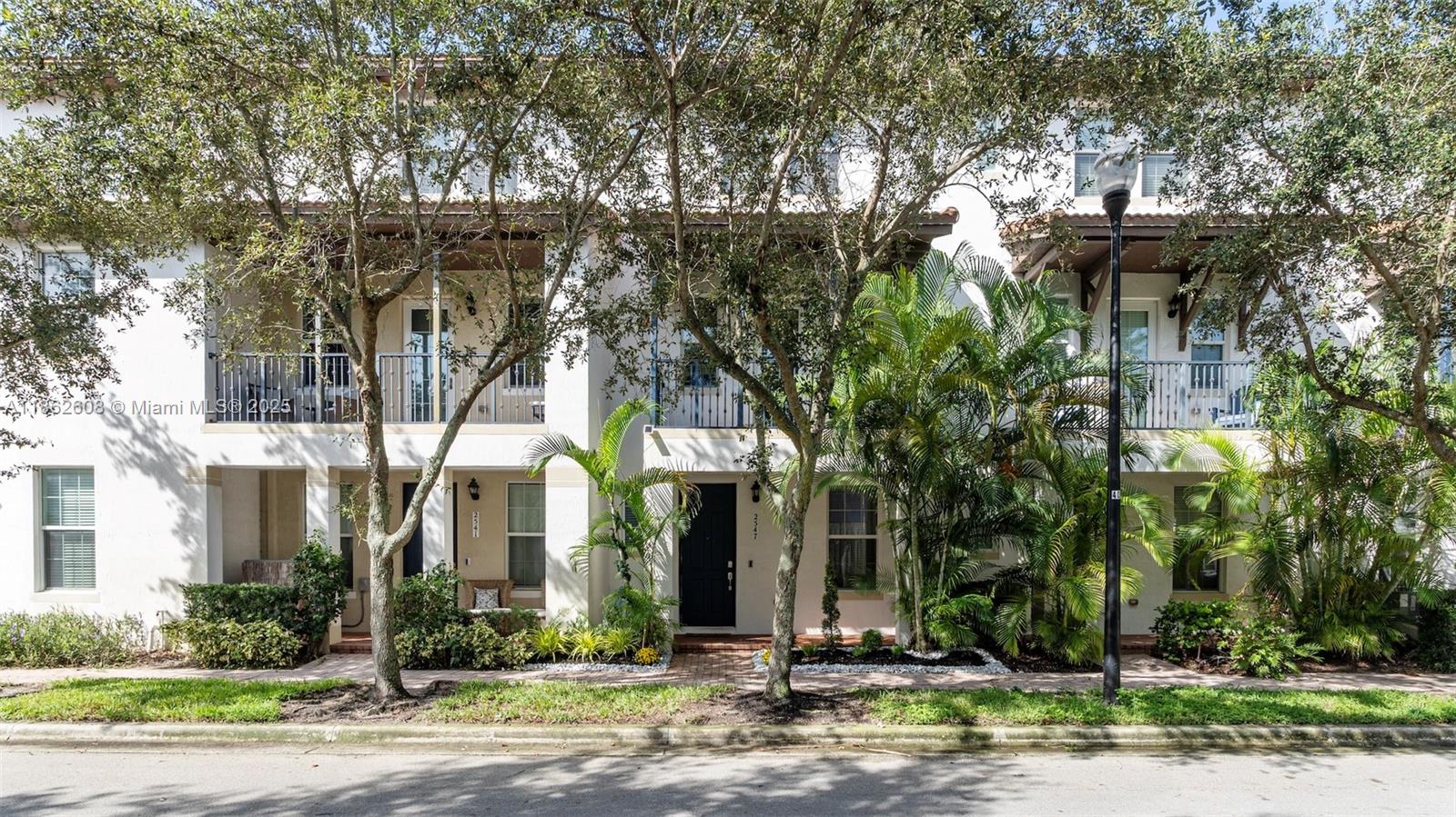 Welcome to Montclair! This stunning 3BD/3.5BA townhome blends style, comfort & convenience. Rare 1st-floor suite offers privacy for guests or family. The gourmet kitchen features sleek cabinetry, stainless appliances & striking backsplash, opening to a spacious living area with custom stone TV wall. Upstairs, the balcony overlooks the kids’ park—perfect for coffee or sunsets. The master retreat boasts modern illuminated vanity, luxury tub & spa-like shower. Impact windows, 2-car garage & elongated driveway for up to 5 cars add value. LOW HOA includes cable & internet! Montclair offers a gated lifestyle with pool, gym, walking trail & lake views. Ideally located in Miramar—between Miami & Fort Lauderdale, with quick access to I-75, Turnpike & I-95—near top schools, parks, shopping & dining.