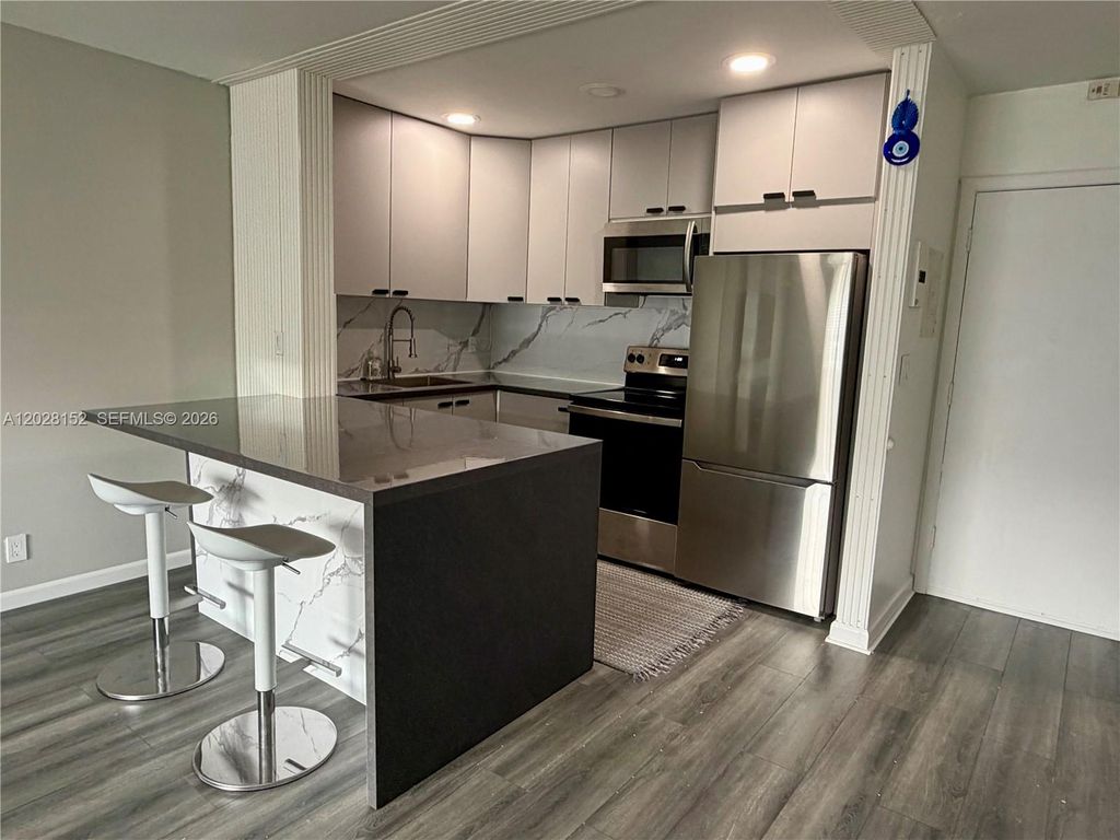 Photo of 1520 Mckinley St #107E, Hollywood, FL 33020 (MLS # A12028152)