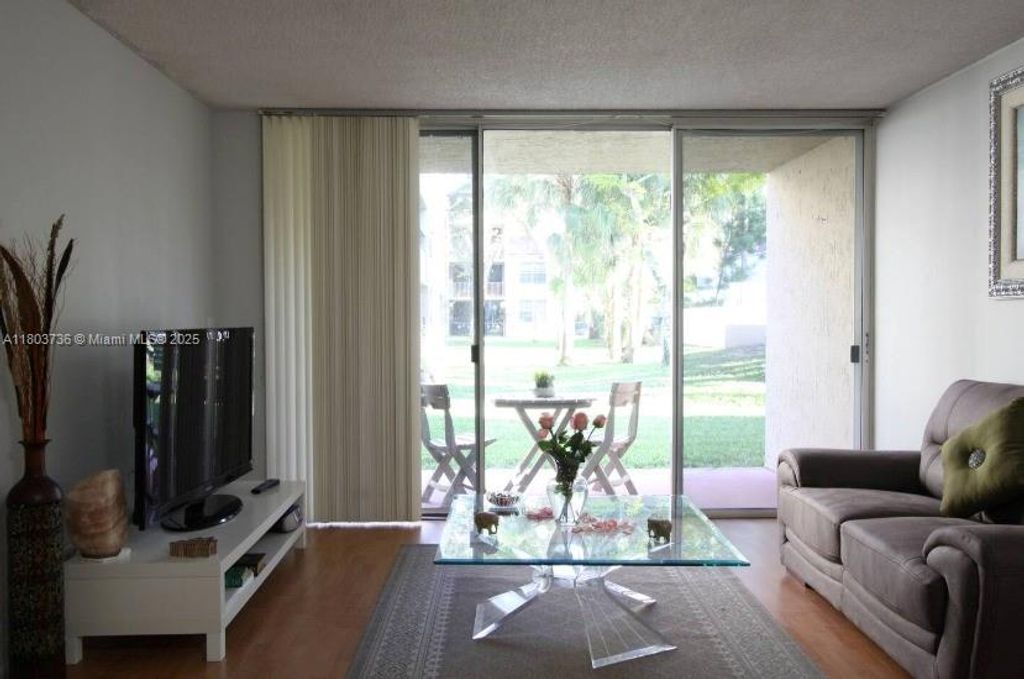 Photo of 8316 NW 24th St #8316, Coral Springs, FL 33065 (MLS # A11803736)