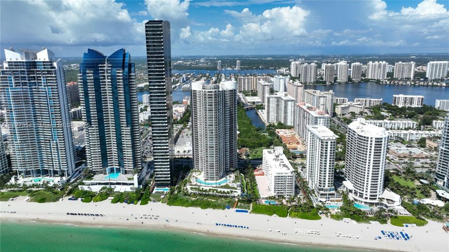 Gorgeous apartment on the beach! This is a split 2 Bedroom 2 Bath floor plan, each room has its own attached bath and balcony access.  This 5 star building includes, 24hr valet parking and concierge, beach access/services, amazing beachside restaurant, pool with an ocean view. Gym with sauna, yoga classes and much more. Unit comes with one assigned parking spot plus complimentary valet for a second vehicle. Located close to shopping, dining and public parks. Do not miss this opportunity. Seller motivated. Furnishing can be included at buyers request.