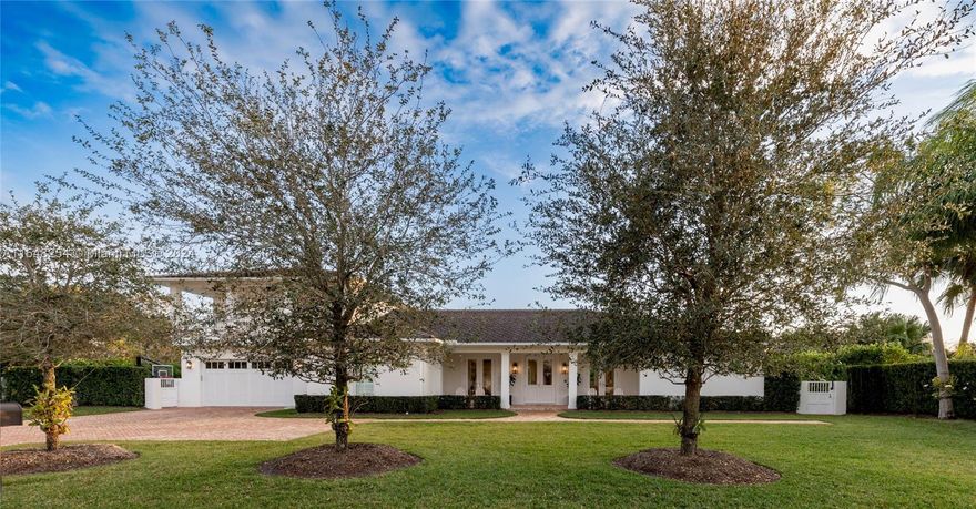 Discover unparalleled luxury in this exquisite 2019-built, 5 bed, 5 1/2 bath residence nestled in the heart of the prestigious Continental Park community. Set on a 17,963 sf corner lot, this home masterfully blends Old Florida charm with contemporary elegance & sophistication. The interior showcases a TV room, a dedicated office, & stunning millwork, complemented by state-of-the-art Control 4 smart home technology. The chef's kitchen is a culinary delight with GE Monogram & True appliances, set against the backdrop of elegant mystery white marble counters. Outdoor living is redefined with a pool, jacuzzi, & a lush patio of Dominican coral, creating a serene oasis.Dual laundry rooms, a cozy gas fireplace, & a durable Boral Madera Concrete Tile roof enhance the home's functionality & appeal.