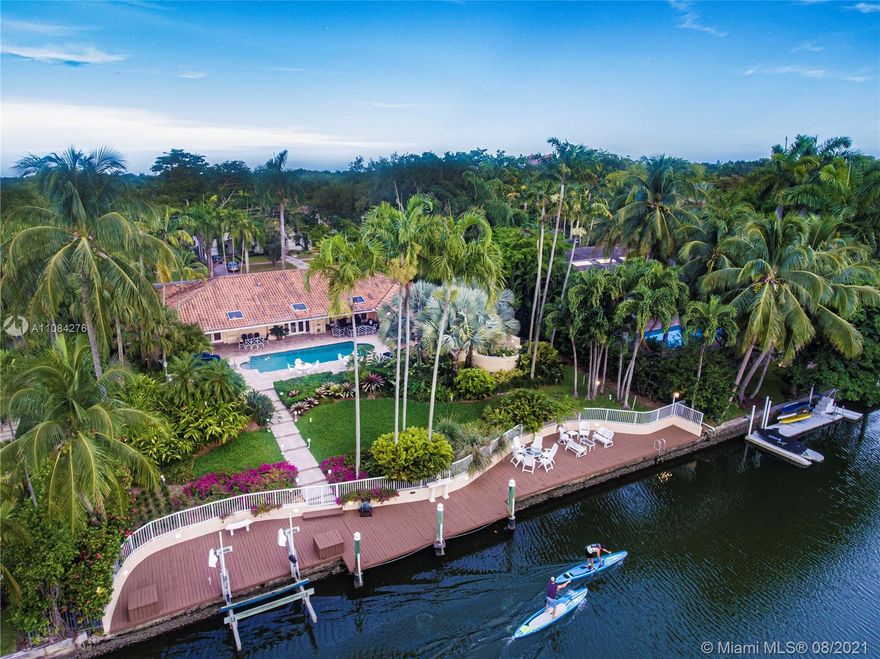 Spectacular WATERFRONT home with an address to match, on the most sought after Riviera Drive, Coral Gables wide waterway, East of US-1. 5-bedrooms, 4Baths, this well maintained home has a large pool, covered patio, impact windows and doors, summer kitchen large living areas, hot tub off the master suite. It is walled in, has circular driveway and two car garage. The property is beautifully landscaped, and has a large dock and boat lift on the widest section of the waterway. homes like this, rarely come on the market, as those who buy on the Riviera waterway usually stay for decades as is the case with this home. The Coral Gables waterway has two 18 ft + bridges to the bay and is one of the best hurricane harbors in South Florida. This is a unique opportunity.