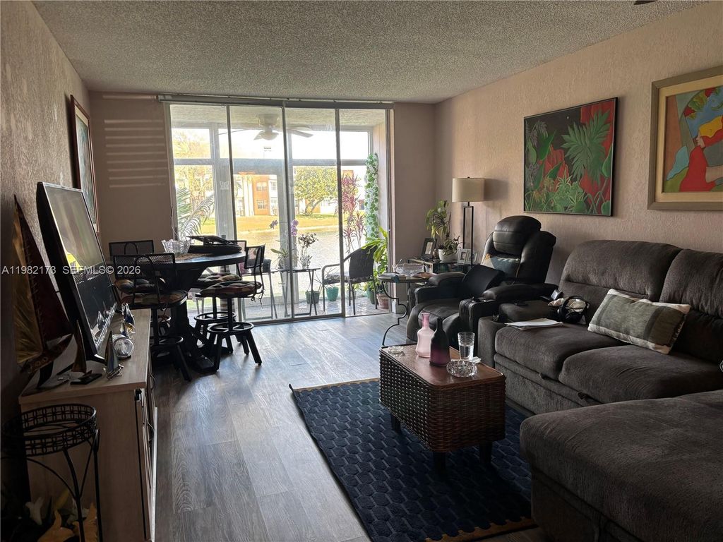 Photo of 9900 Sunrise Lakes Blvd #107, Sunrise, FL 33322 (MLS # A11982173)