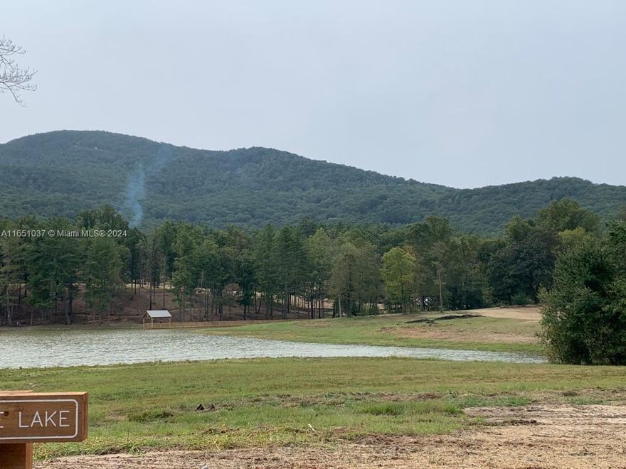 Welcome to Historic Helen, GA, renowned for its World Famous Oktoberfest! This 1.00 acre parcel presents a fantastic investment opportunity, whether you plan to build your dream cabin or farmhouse, or simply hold onto it to build equity until you’re ready to develop. Yonah Mountain Lake offers a brand-new lakefront and mountain property just minutes from the vibrant town of Helen. This corner lot features partial lakefront access and is situated right in front of the clubhouse—essentially, the community barbecue area and pier are part of your backyard! Treat yourself to a break from the hustle and bustle of city life. Take a short drive to the mountains and claim this slice of paradise today!