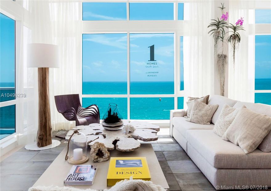 This rare 2 story northeast corner "Trophy" Penthouse features award winning interior design by Artefacto. 3,557 SF of "Turn-Key" living with breathtaking direct ocean views! Top of the line finishes;Italkraft kitchen,Wolf/Subzero appliances & white oak flooring throughout.LEED Certified Hotel living;rooftop pool,bars & sand filled lounges.Private residential lobby,concierge & chauffeured Tesla.600 linear ft of beachfront, 4 pools,14,000SF fitness center,Bamford Spa,full beach & pool service,valet & more.