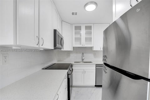 Tiny photo for 2970 NE 16th Ave #214, Oakland Park, FL 33334 (MLS # A12077675)