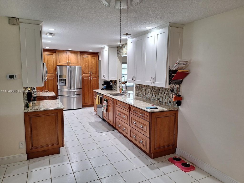 Photo of 1106 SW 16th St, Boynton Beach, FL 33426 (MLS # A11749063)