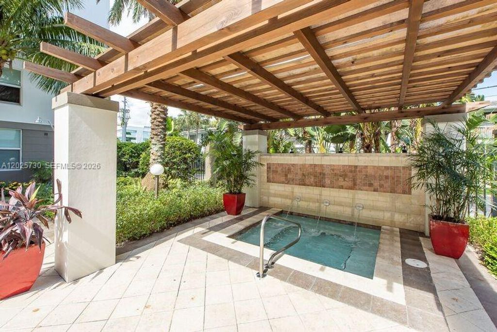 Photo of 2421 NE 65th St #408, Fort Lauderdale, FL 33308 (MLS # A12025730)