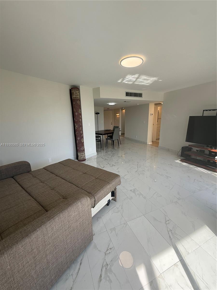 ENSENADA CONDO BLDG E-II - Residential Lease