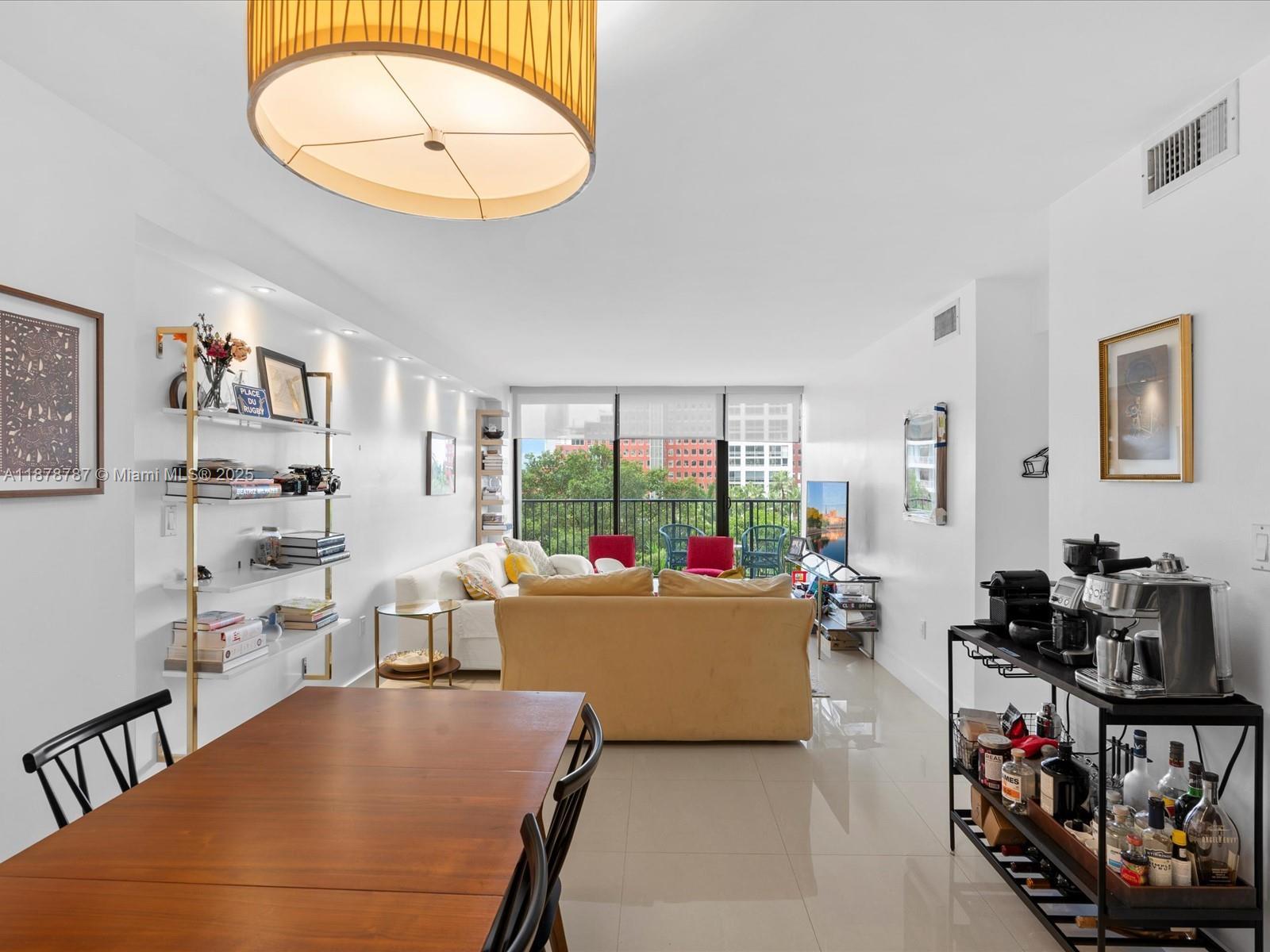 Gorgeous unit with newly tiled floors, an updated kitchen with a raised ceiling, and gorgeous South East-facing bay views. Open updated and functional kitchen with new cabinets, under cabinet lighting, granite countertops, and stainless steel appliances. Full-size second bedroom ideal as a kids room, office, or guest room. Spacious master remodeled with new tile, frameless shower glass, retiled showers, cabinets, and countertop. Self closet organizers installed in master (walk-in), guest, and hall closets with good size closets. Fantastic secure well-established building with tons of amenities: 2 tennis courts, gym, child playroom, library, 2 party rooms, BBQ area, and sauna/hot tub.