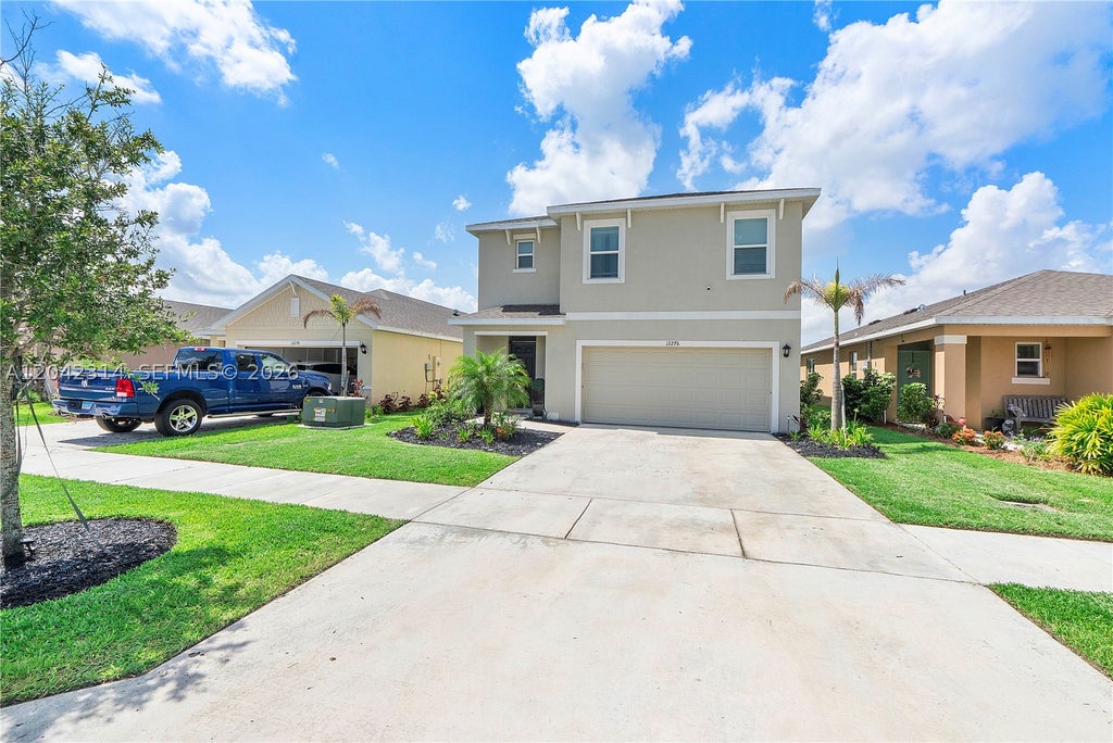 Photo of 12276 SW Nettuno Way, Port St Lucie, FL 34987 (MLS # A12042314)