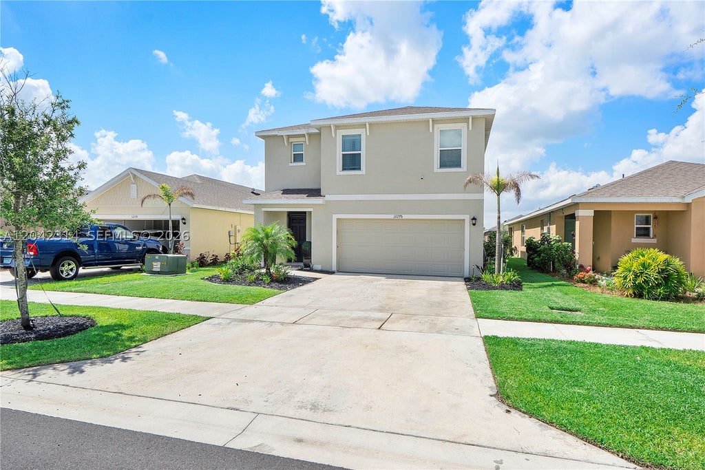 Photo of 12276 SW Nettuno Way, Port St Lucie, FL 34987 (MLS # A12042314)