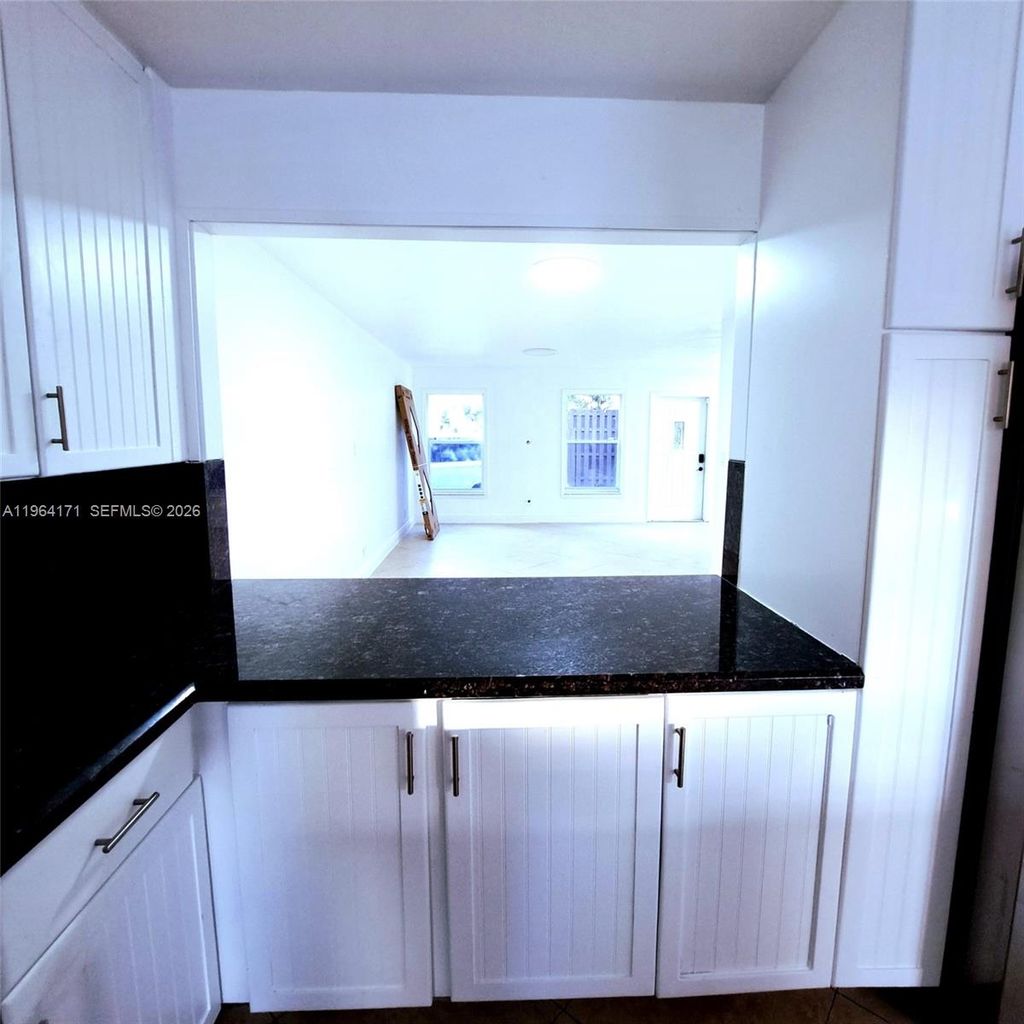 Photo of 3920 Woodside Dr #8, Coral Springs, FL 33065 (MLS # A11964171)